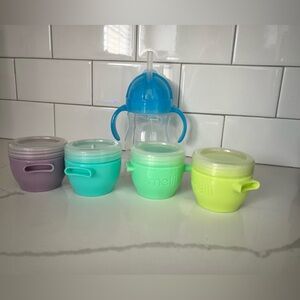 Baby porridge storage boxes and a drinking bottle.